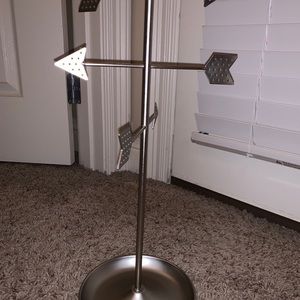 Silver arrow jewelry stand